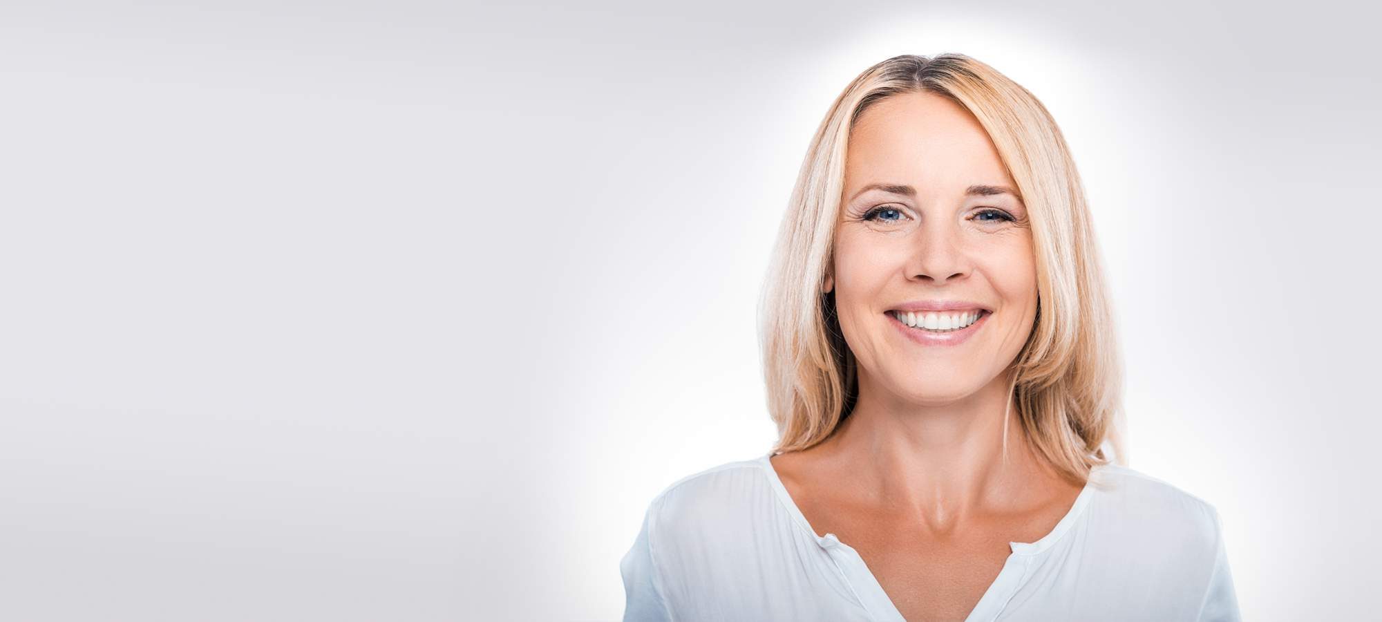 Blond woman in white T
